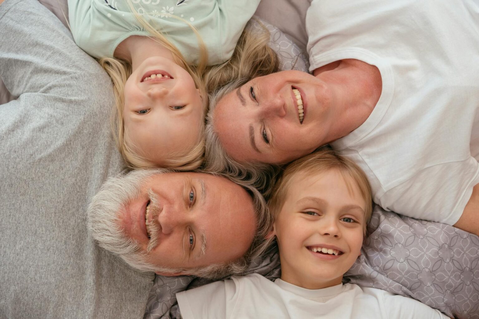 grandparents and their grandchildren on the floor