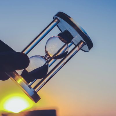pexels-photo-1209999 person holding hour glass